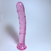 Red crystal dildo with realistic texture and ergonomic design for pleasure